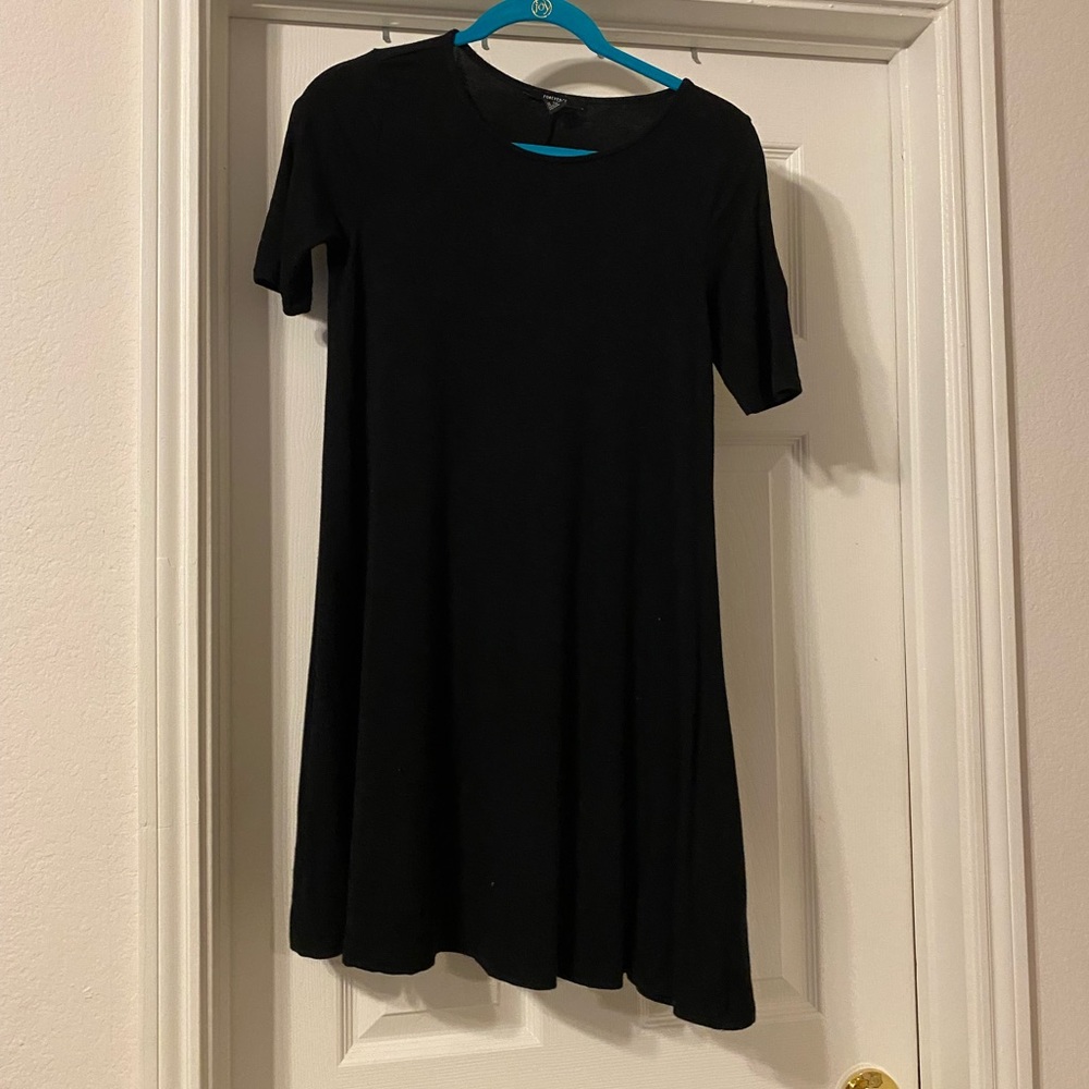 Black stretch knee length dress. Perfect to dress down or dress up
